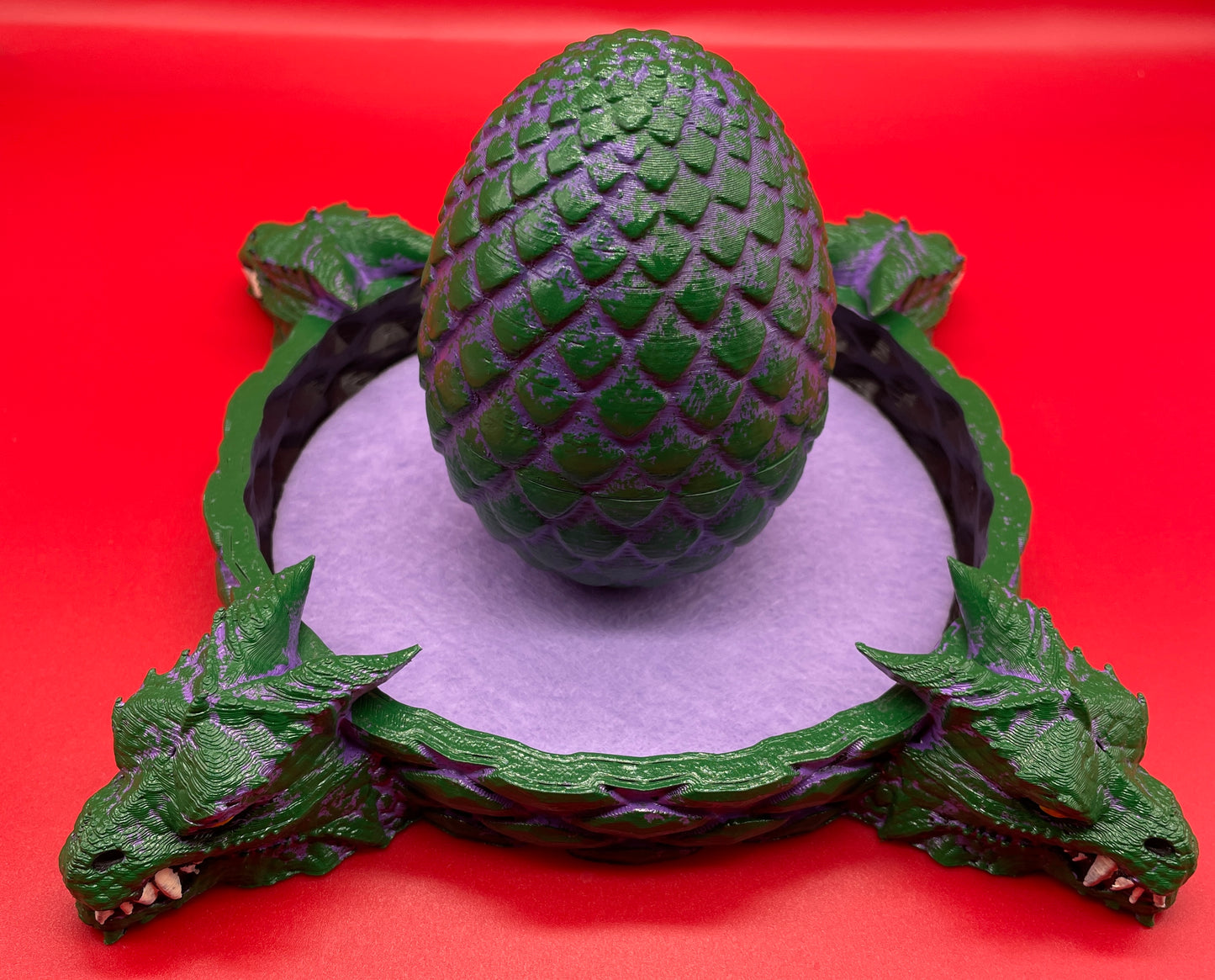 Lord Elemere's Dragon Egg Dice Shaker and tray with matching dice. Purple / Green version