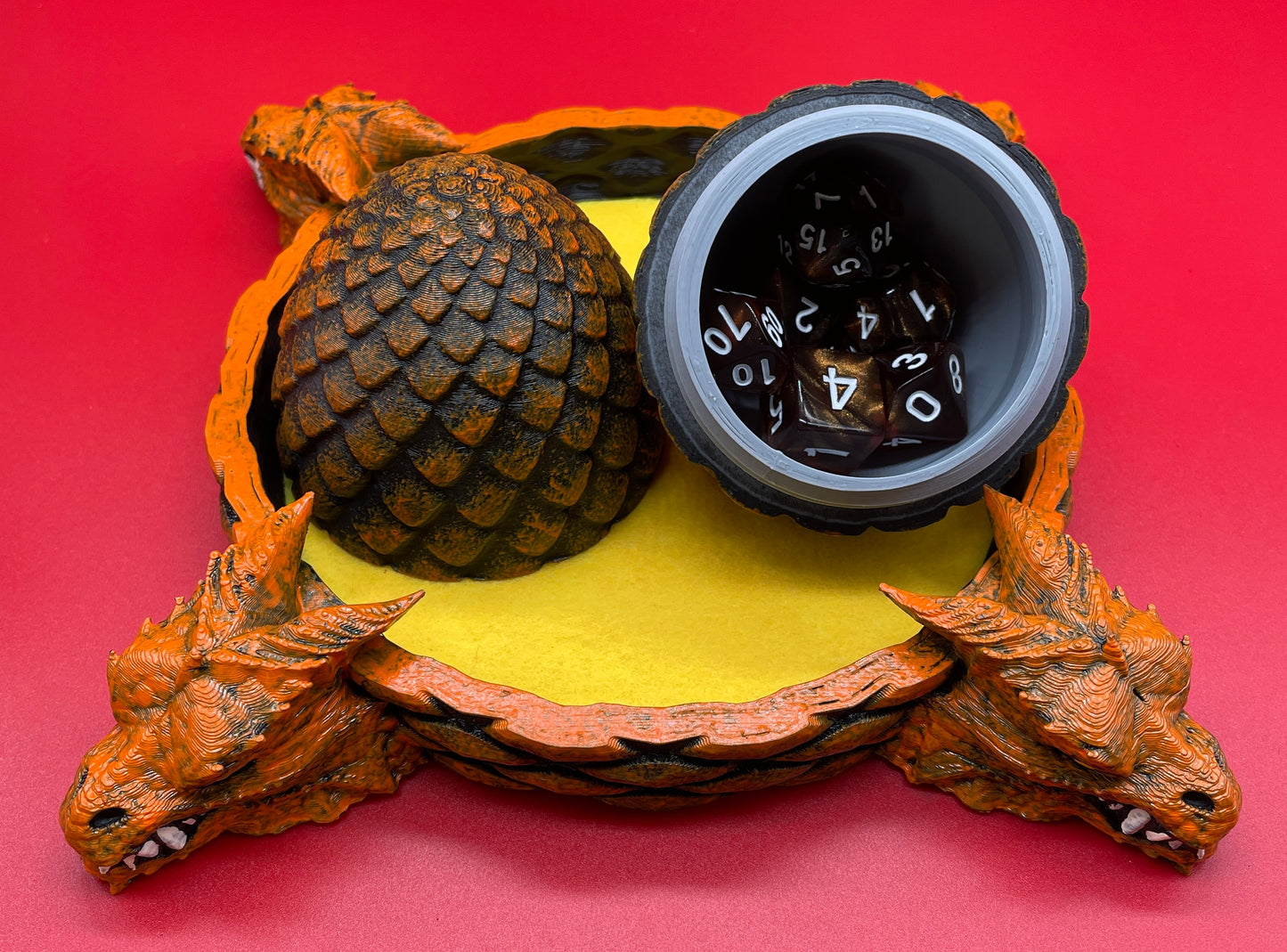 Lord Elemere's Dragon Egg Dice Shaker and tray with matching dice. Orange / Yellow version