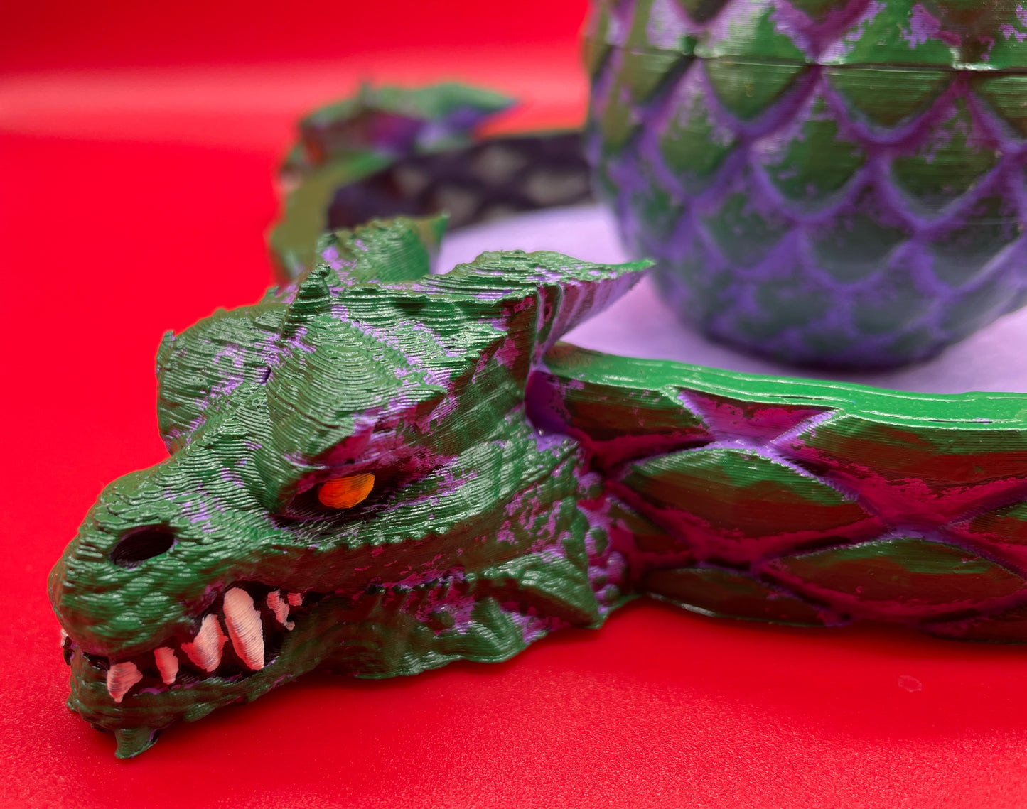 Lord Elemere's Dragon Egg Dice Shaker and tray with matching dice. Purple / Green version